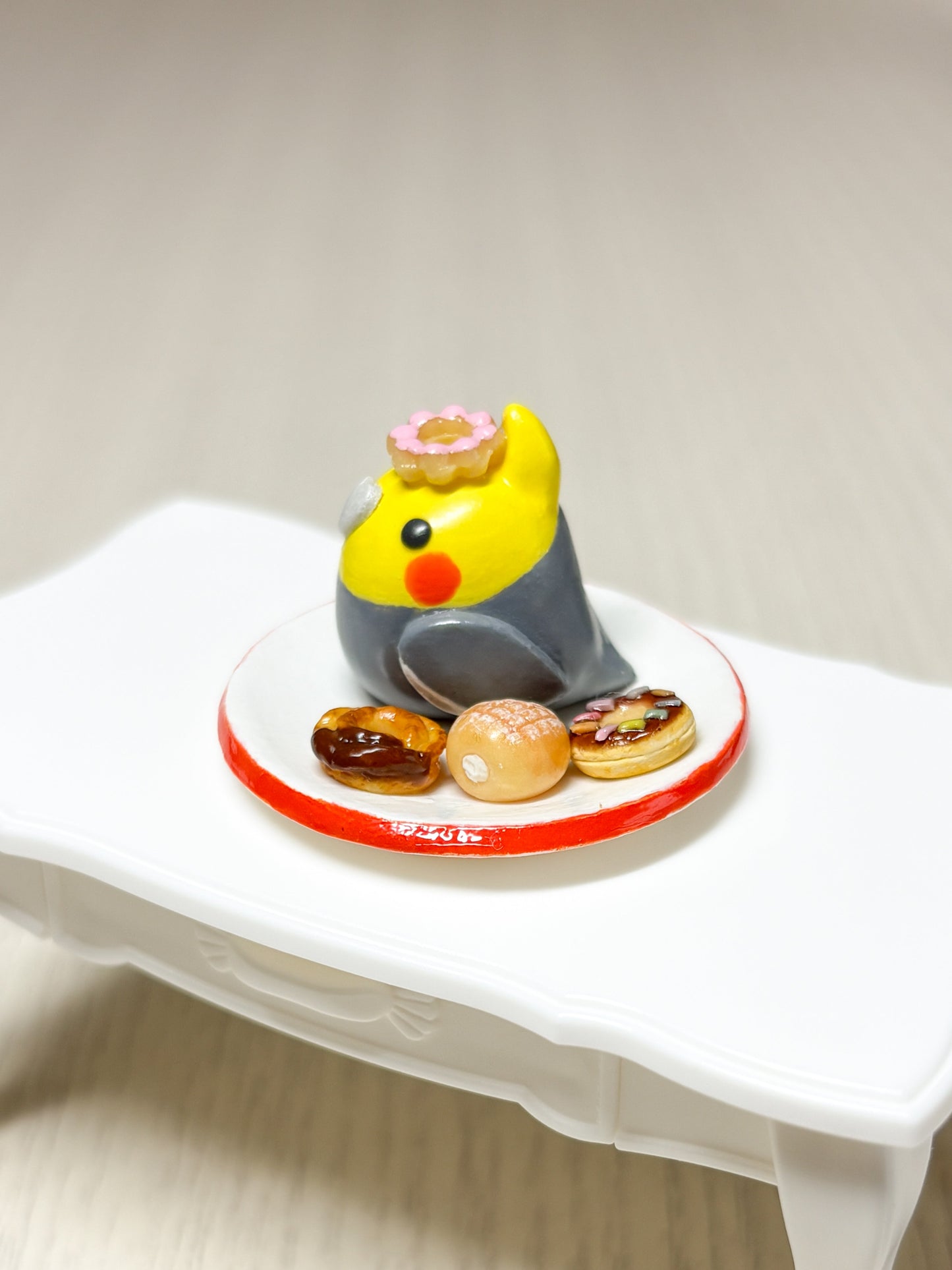 Collectible Miniature Cockatiel with Donuts