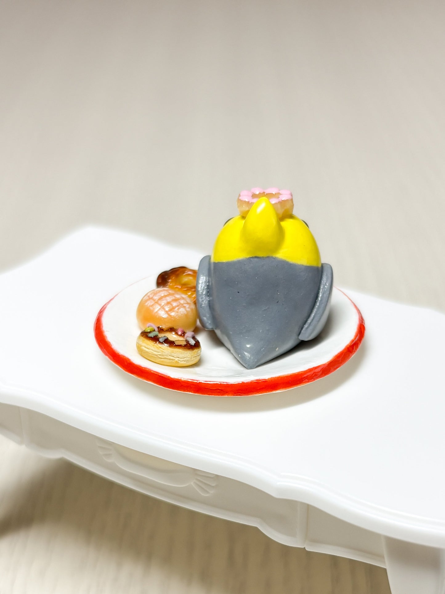 Collectible Miniature Cockatiel with Donuts