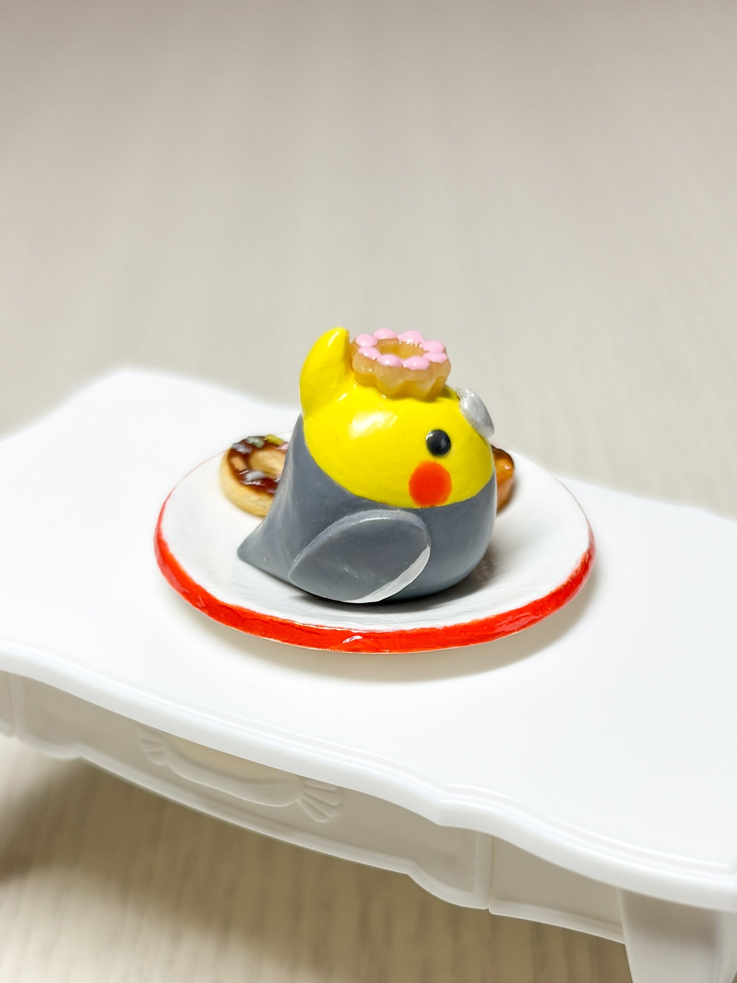 Collectible Miniature Cockatiel with Donuts