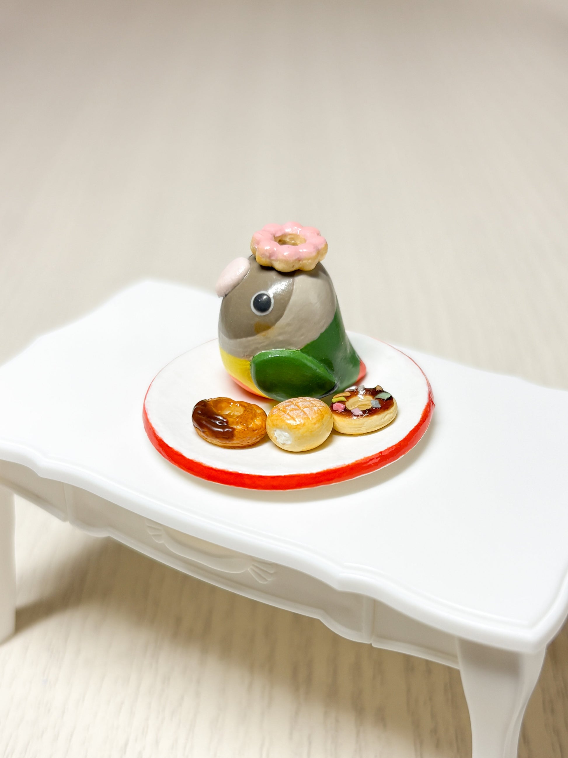 Collectible Miniature Conure with Donuts - Sweet Birdie Boutique International