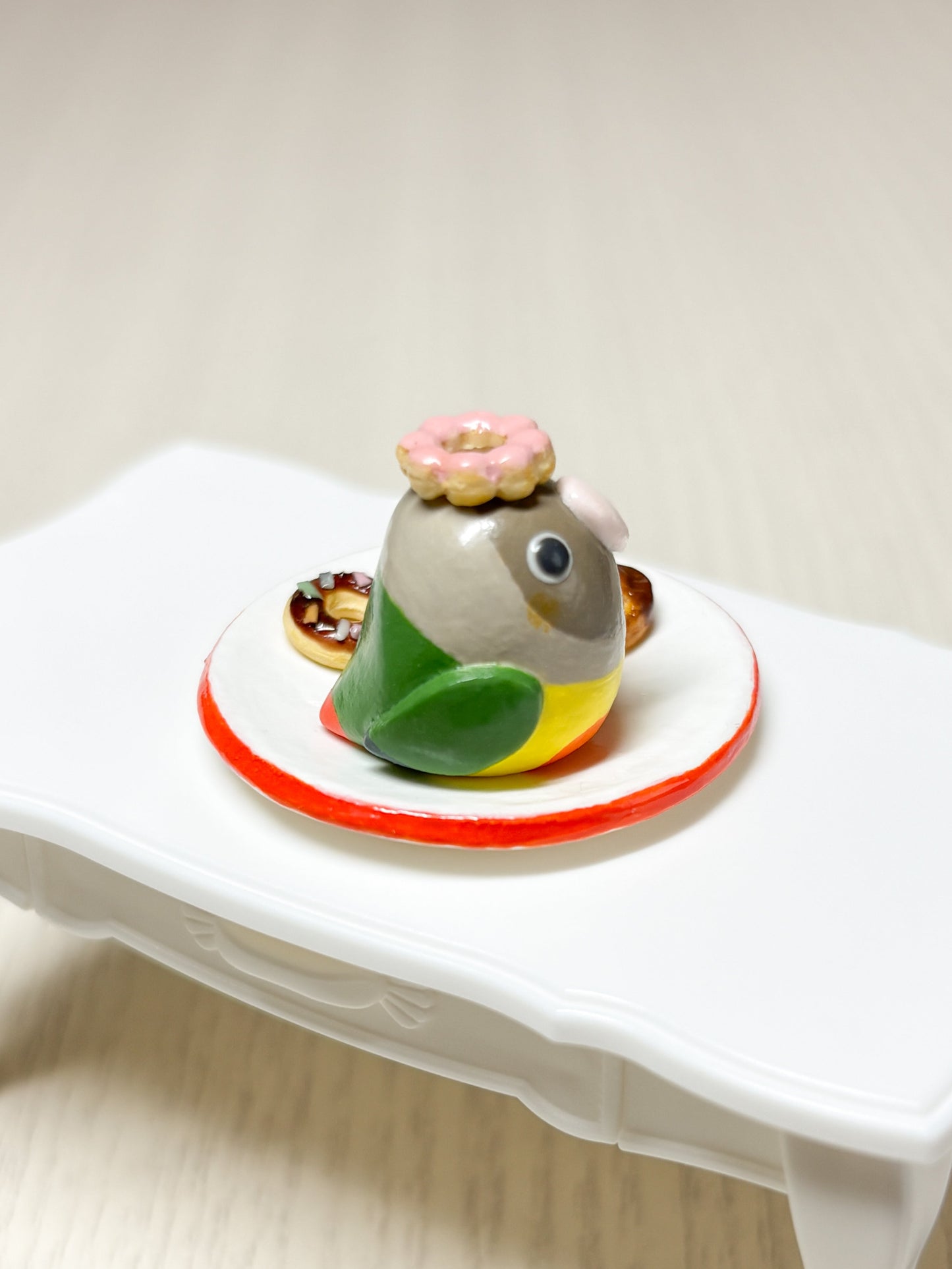 Collectible Miniature Conure with Donuts - Sweet Birdie Boutique International